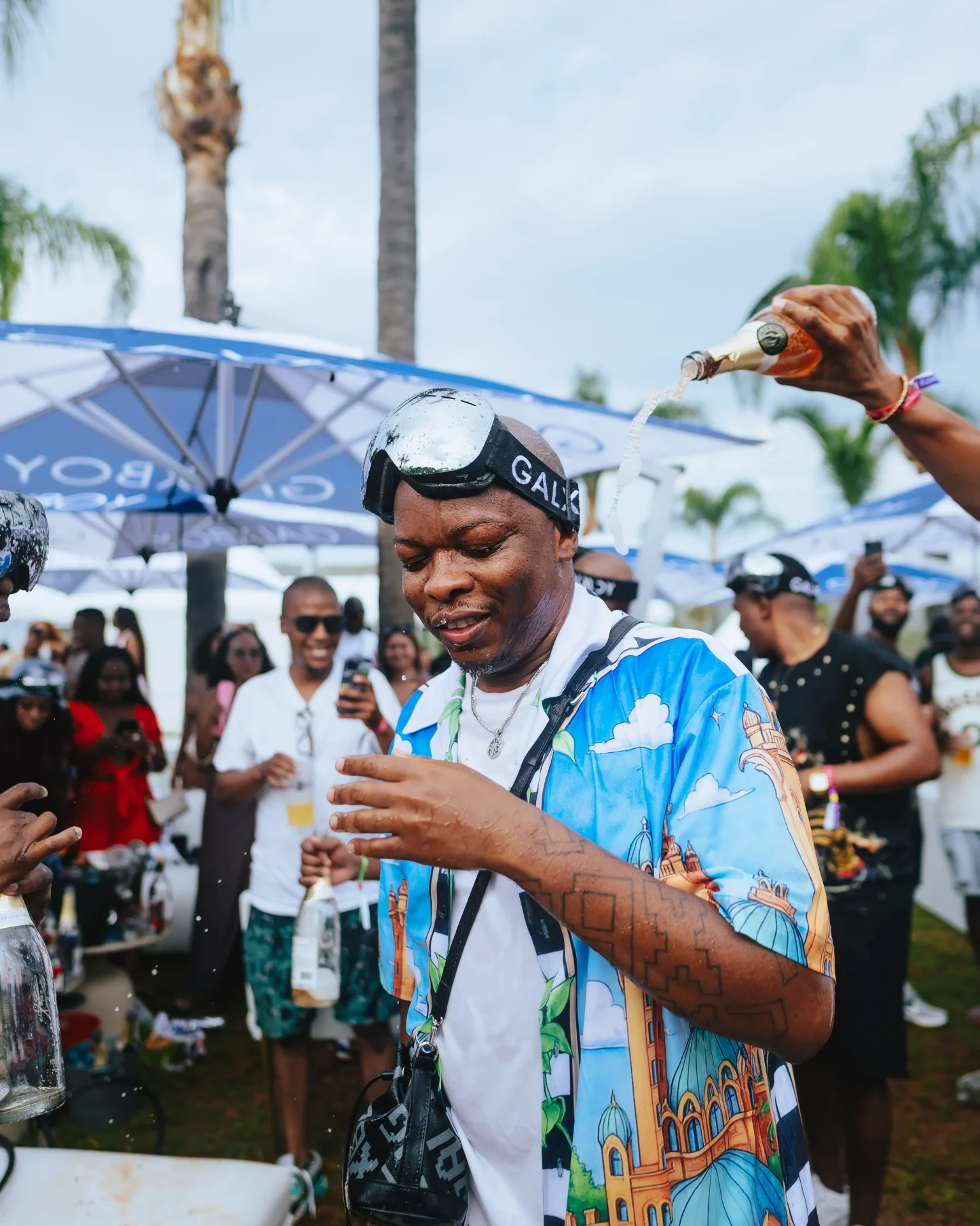 Bottle service moment on the lawn at the Sun City Take Over